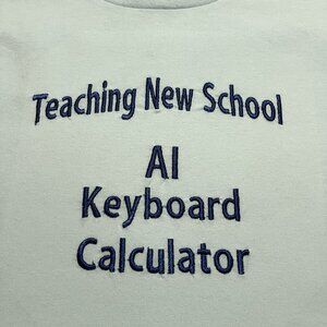 Teaching New School Size Medium T-shirt with Navy Embroidery on the front.